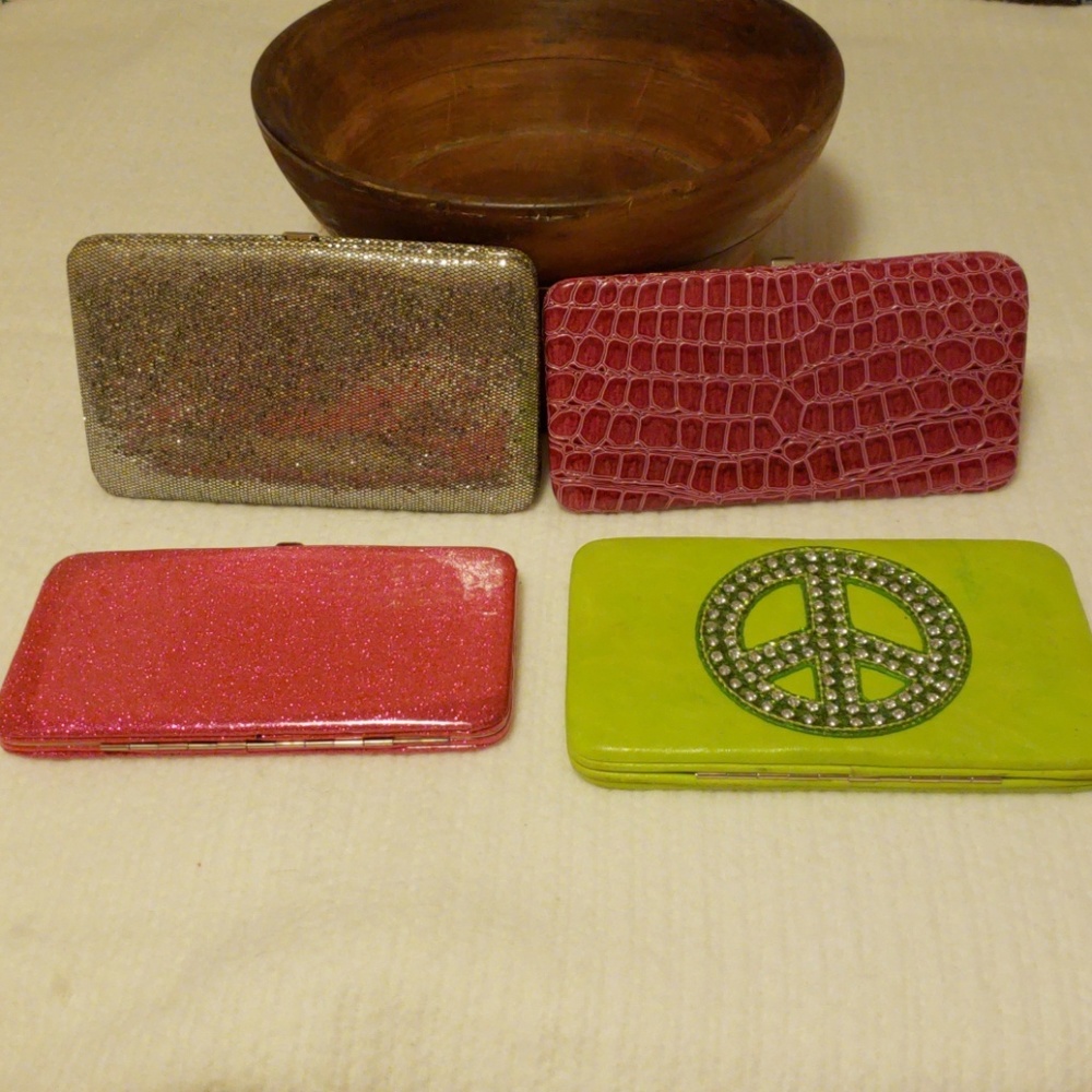 Lot of 4 hard wallets